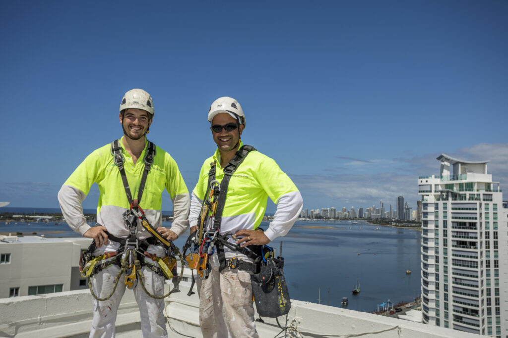 programmed property services abseil painting team